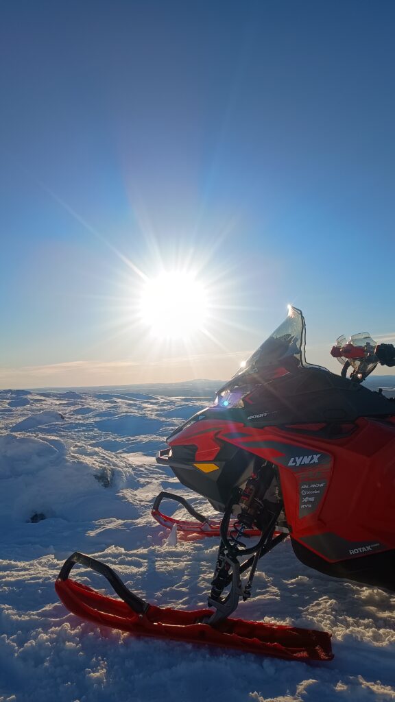 Private snowmobile trip to wilderness