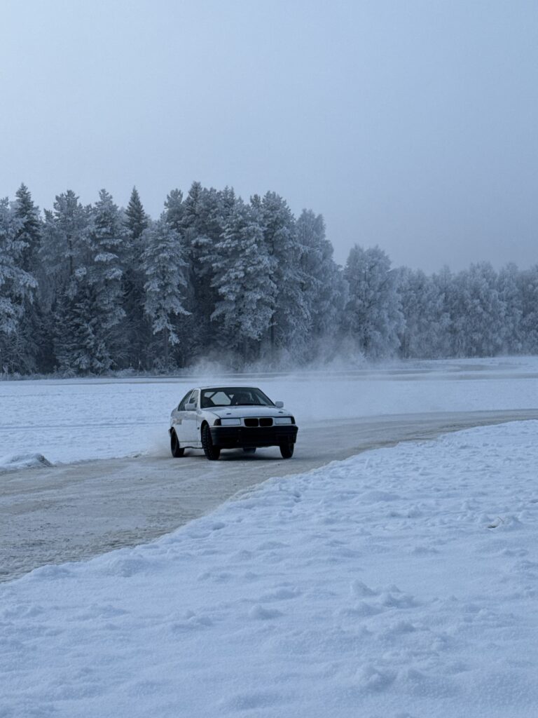 Driving a rally car on an ice track